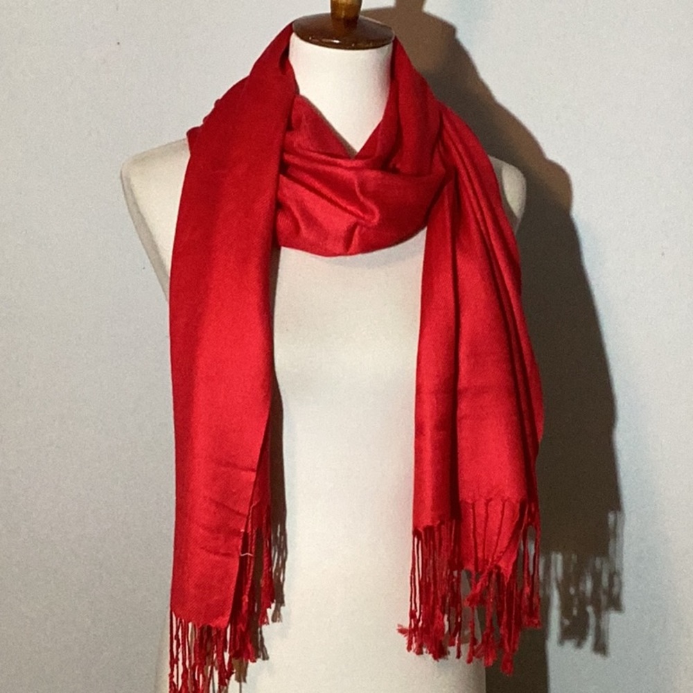 Shawl or scarf with knotted fringe. Vibrant red 70” x 27”.